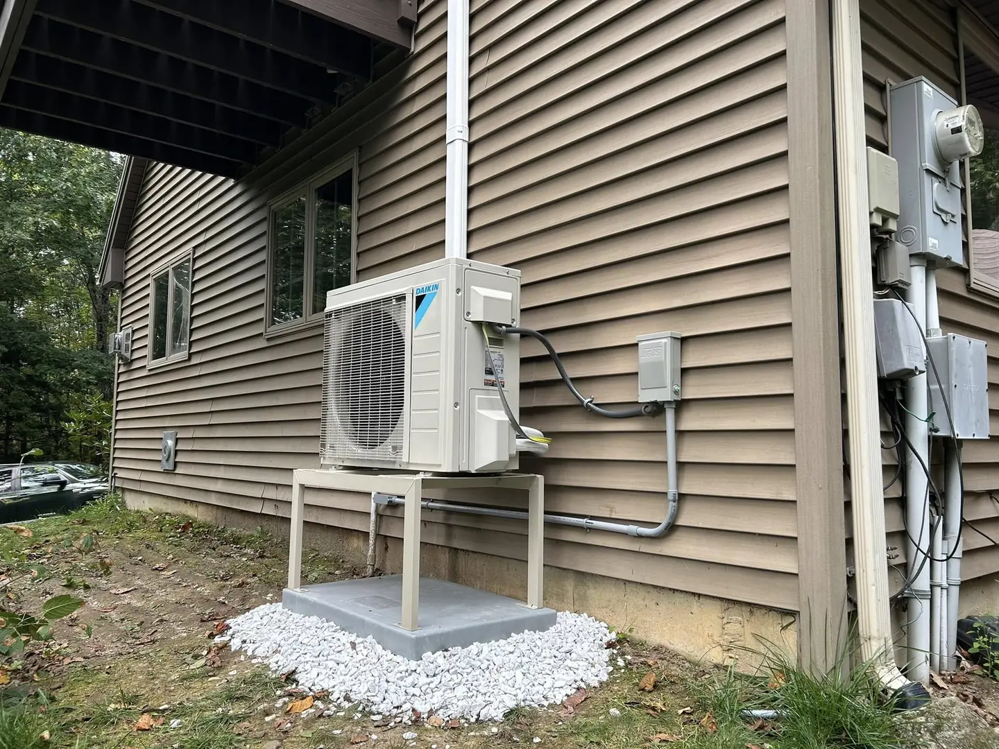 Outdoor ductless equipment with exterior piping detail